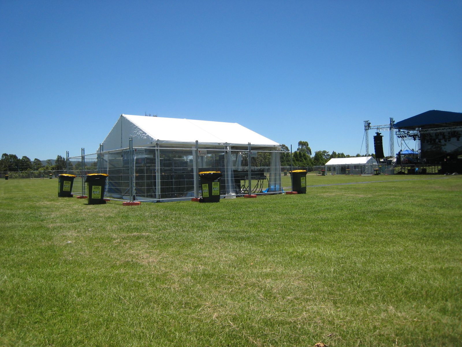 Temporary mesh fencing forming an event perimeter